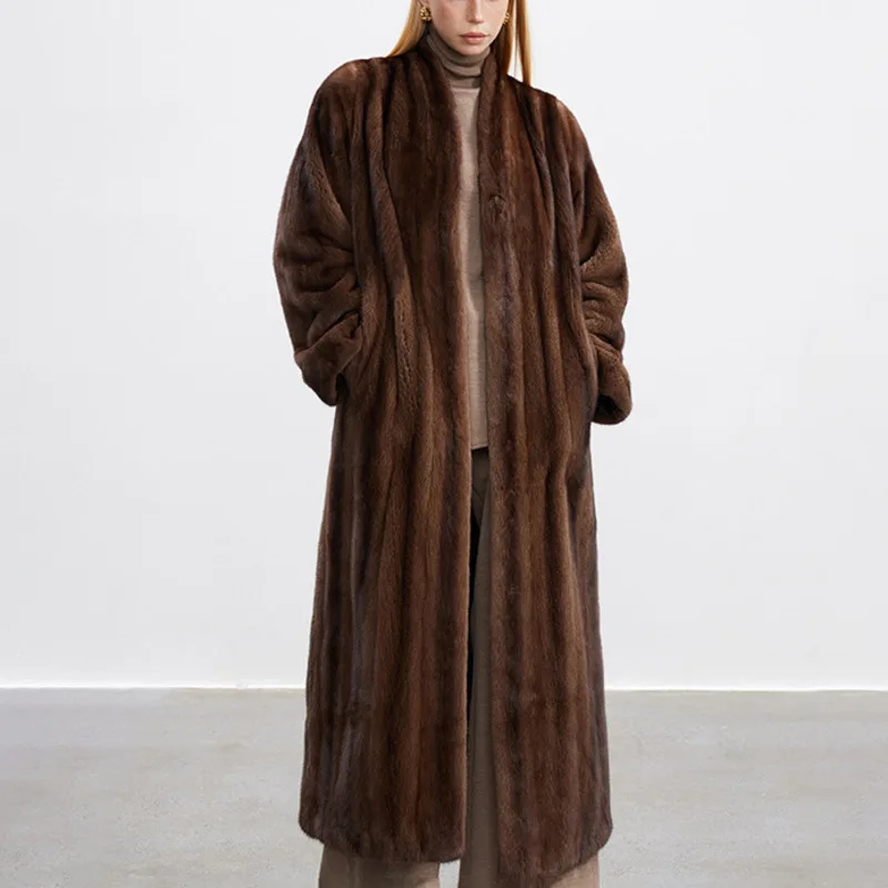 TOKO 2025 New Women's Fashion Solid Color Loose-Sleeved Fur Coat: Loose Fit, A Stylish And Elegant Winter And Autumn Warm Coat